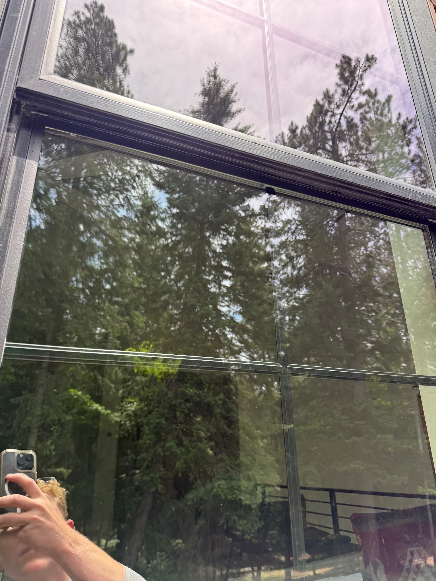 The same window glass crystal clear after a purified-water cleaning